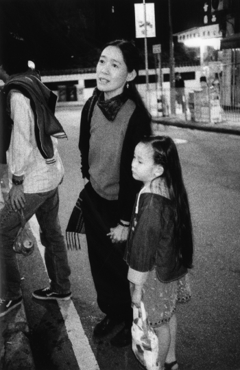 Artist Sze Yuen and her daughter, at the opening of Ricky Yeung's retrospective exhibition, Para site art space, Po Yan Street, Tai Ping Shan, 1 November 2002