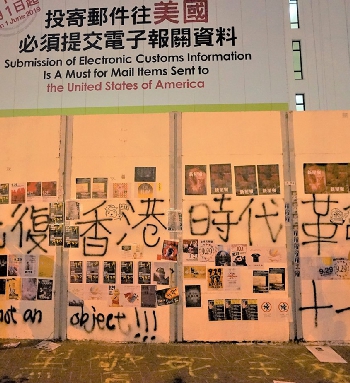 Protest graffiti and posters on a wall, Edinburgh Place, Central, 27 September 2019