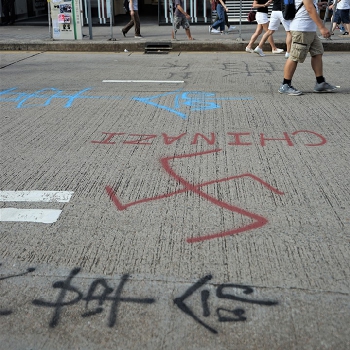 Protest graffiti on the ground in front of a Bank of China branch, Hennessy Road, Causeway Bay, 15 September 2019
