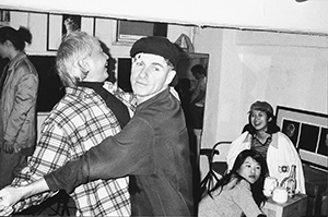 Cinematographer Christopher Doyle (centre) and writer Lau Kin Wai (left), dancing at Visage One,  Central, 10 March 1996