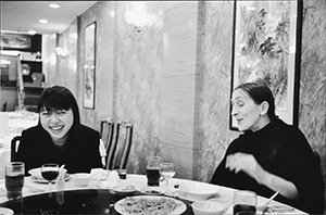 Choreographer Pina Bausch (right) sharing a meal with new Hong Kong acquaintances after watching a Gamelan performance at the Hong Kong Cultural Centre, 10 November 1996