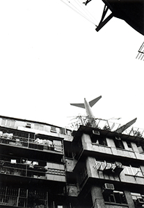 Plane coming in to land at Kai Tak airport, Kowloon City, 24 December 1996