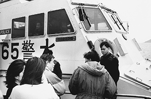 Marine police launch stopping a vessel off Tuen Mun to conduct a check of documents, 23 March 1997