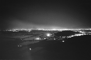 Nighttime view from Tin Shui Wai, showing ponds, 1 November 1997