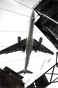 Plane coming in to land at Kai Tak airport, Kowloon City, 12 May 1998