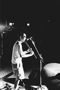 Nelson Hiu, performing outside the Hong Kong Cultural Centre at a June Fourth memorial concert, 3 June 1998