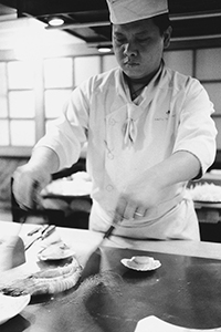 Chef cooking prawns in a Japanese restaurant, Stanley Street, Central, 26 January 1999