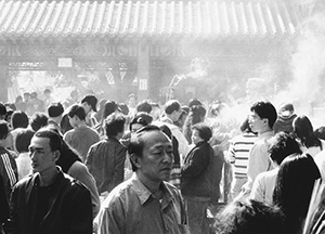 Wong Tai Sin Temple, Kowloon, busy with visitors on the first public holiday of the year, 1 January 1996