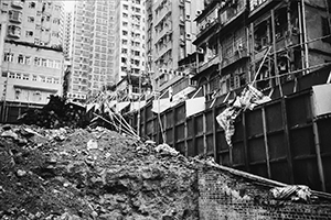 Demolition site, with old and new buildings behind, Sai Ying Pun, 1 May 1996