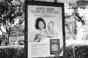 Government poster on a bus shelter opposite Queen Mary Hospital, inviting applications for British National (overseas) passports, 28 January 1997