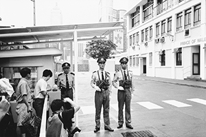 People's Liberation Army soldiers on guard duty at the former Prince of Wales Barracks, Central, on the first day of Chinese sovereignty, 1 July 1997