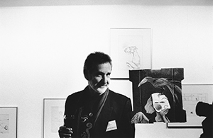 South African poet Breyten Breytenbach at the opening of the Hong Kong International Poetry Festival, with one of his paintings, Hong Kong Arts Centre, Wanchai, 10 January 1997