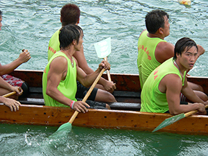 Unsuccessful team after the finish of a dragon boat race, Aberdeen Harbour, 11 June 2005