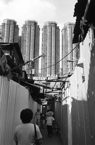 Diamond Hill, with squatter huts awaiting clearance and view of newer development Hollywood Plaza behind, 30 April 2001