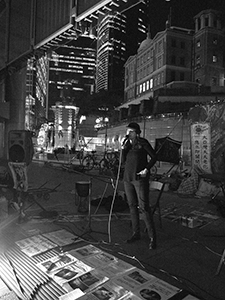 Madeleine Slavick reading her poetry at the ‘Occupy’ protest camp in the public plaza beneath the Hong Kong and Shanghai Bank headquarters, Central, 12 December 2011