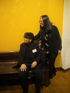 Artists Hon Chi-fun (seated) and Choi Yan-chi, at the opening of an exhibition of Hon's work at the University Museum and Art Gallery, University of Hong Kong, 15 January 2013