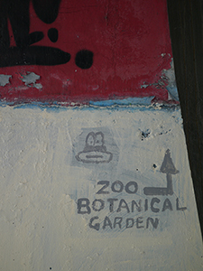 Hand-painted signage on a footpath near the top of Garden Road, 13 February 2013