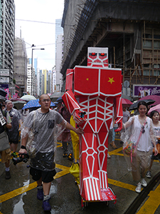 Robot sculpture by Kacey Wong, on the annual pro-democracy march, 1 July 2013