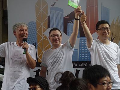 Occupy Central leaders greeting marchers: on the annual pro-democracy march, 1 July 2013