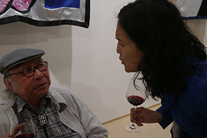 Artist Gaylord Chan with curator Angelika Li, at an exhibition opening at Hanart TZ Gallery, 16 April 2014