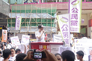 Audrey Eu addressing people arriving for the annual pro-democracy march, Great George Street, 1 July 2014