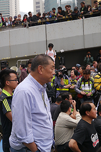 Businessman Jimmy Lai, participating in a sit-in on the final day of the Admiralty Umbrella Movement occupation site, 11 December 2014