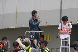 Student leader Alex Chow participating in a sit-in on the final day of the Admiralty Umbrella Movement occupation site, 11 December 2014