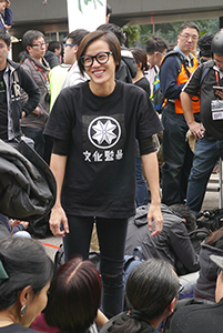 Pop singer Denise Ho, participating in a sit-in on the final day of the Admiralty Umbrella Movement occupation site, 11 December 2014