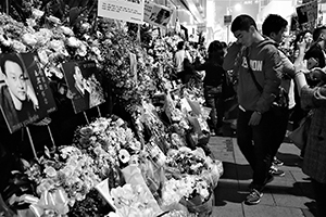 Memorials placed outside the Mandarin Oriental Hotel, Central, in remembrance of actor and singer Leslie Cheung, on the anniversary of his suicide, 1 April 2016