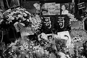 Memorials placed outside the Mandarin Oriental Hotel, Central, in remembrance of actor and singer Leslie Cheung, on the anniversary of his suicide, 1 April 2016