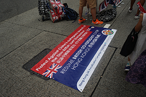 Banner calling for the resumption of British sovereignty over Hong Kong, Wanchai, 1 July 2016