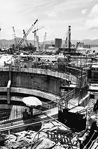 Reclamation in progress, Central, with foundations being dug for One International Finance Centre, 10 July 1996