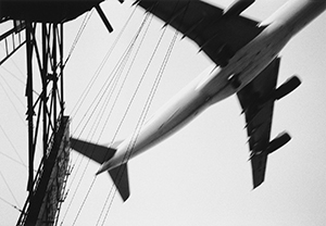 Plane coming in to land at Kai Tak airport, Kowloon City, 24 December 1996