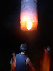 Launching a sky lantern during the Mid-Autumn Festival, Sheung Wo Hang Village, North East New Territories , 6 October 2006