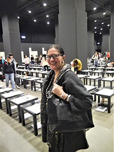 Art historian Catherine Maudsley at Song Dong's '36 Calendars' project, Artistree, Taikoo Place, Quarry Bay, 21 January 2013