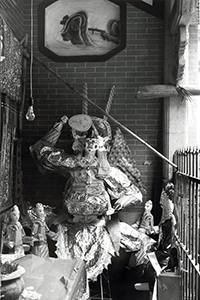 Paper figurine in a temple, Tin Hau, 10 May 1996