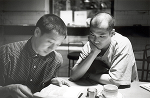 At the Fringe Club Photographers' monthly meeting: Kith Tsang and Warren Leung, 7 October 1996