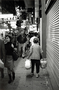 Old lady carrying bags of aluminium cans, near Times Square, Causeway Bay, Hong Kong Island, 7 November 1996
