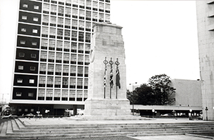The war memorial with British flags, two days before Armistice Day,  9 November 1996