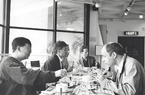 Delegates taking a meal break from a conference at the Hong Kong Arts Centre, Wanchai, 14 December 1996
