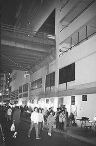 Elevated roadway through a building, Temple Street night market, Kowloon, 15 December 1996