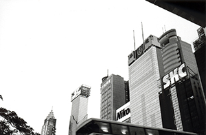 Tall buildings with rooftop advertising signs, Gloucester Road, Causeway Bay, 22 December 1996