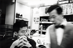 Waiter taking the order in a Wanchai restaurant, 3 December 1996