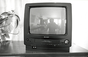 Reflection on the screen of a TV with video recording capacity built in, Sha Wan Drive, Pokfulam, 20 April 1997
