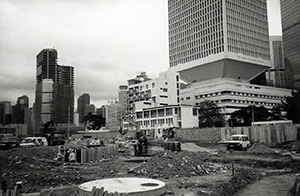 Reclaimed land in front of the Prince of Wales Barracks being made good in time for the handover, 17 May 1997