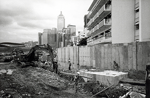 Reclaimed land in front of the Prince of Wales Barracks being made good in time for the handover, 17 May 1997