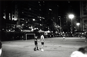 Footballer and referee, Southorn Playground, Wanchai, 23 May 1997