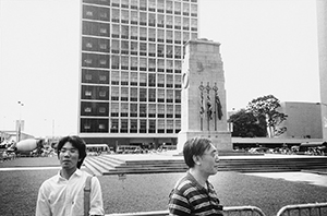 British flags flying on the Cenotaph for the last time, with City Hall High Block visible behind, 30 June 1997