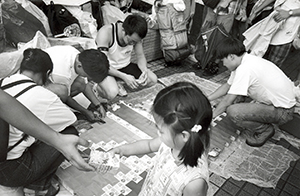 Participants at a celebratory event for the handover, Hong Kong Island, 30 June 1997