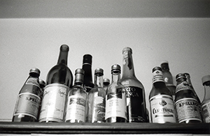 Bottles on top of a kitchen cabinet, Sha Wan Drive, Sandy Bay, 23 November 1997